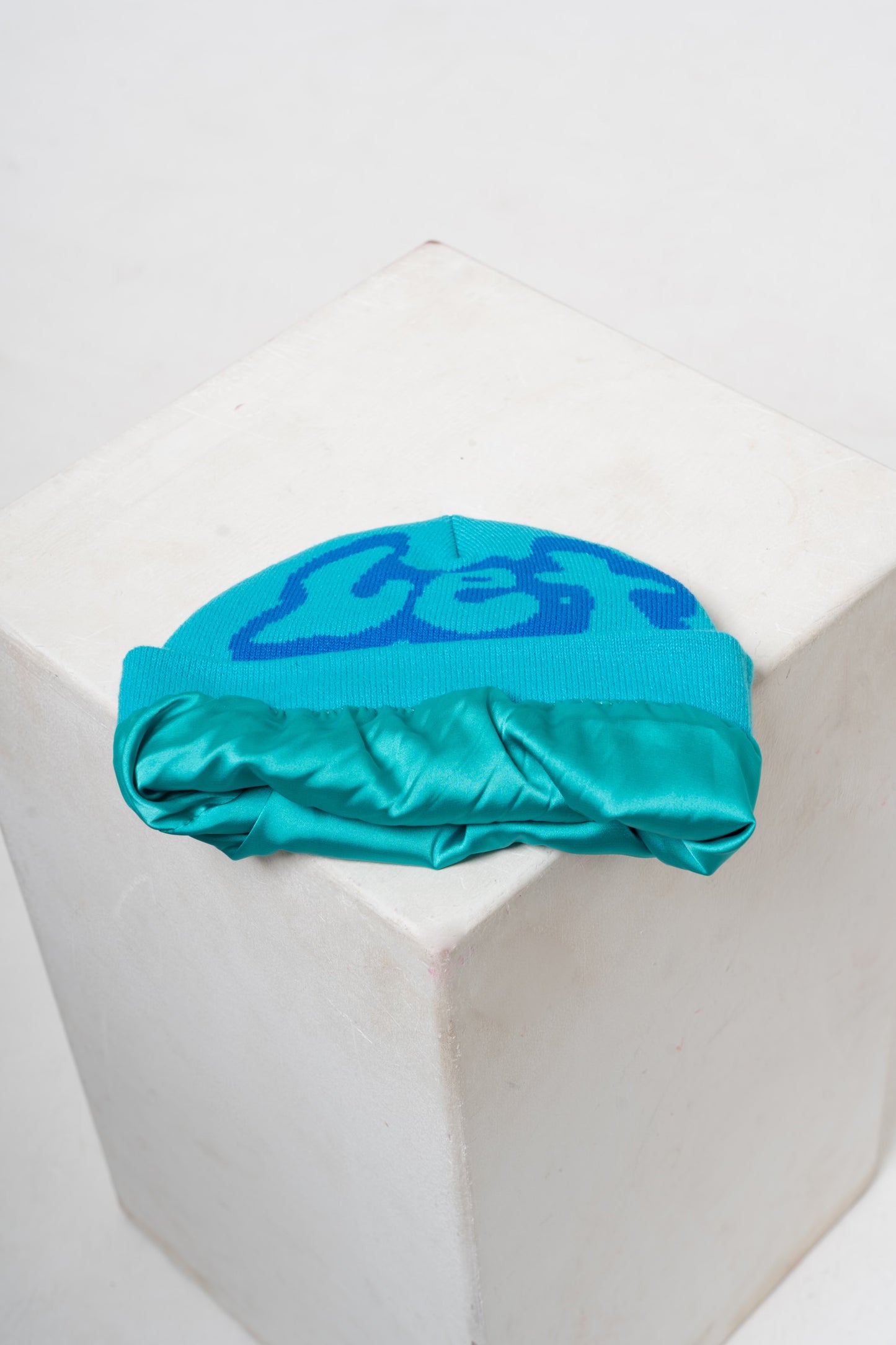 Turquoise LGD beanie with Satin-Lined Interior